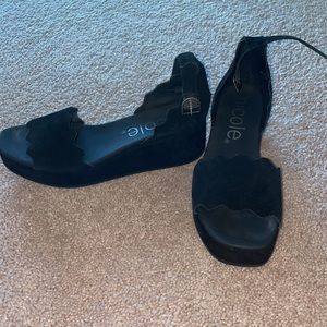 black platform sandals with adjustable ankle strap